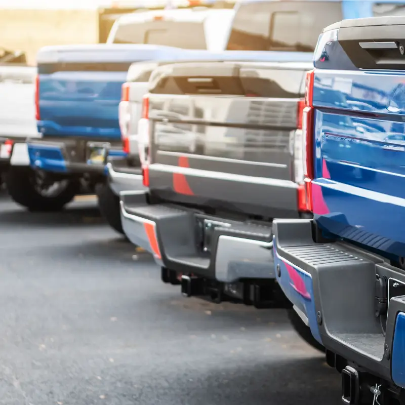 Image of a fleet of pickup trucks